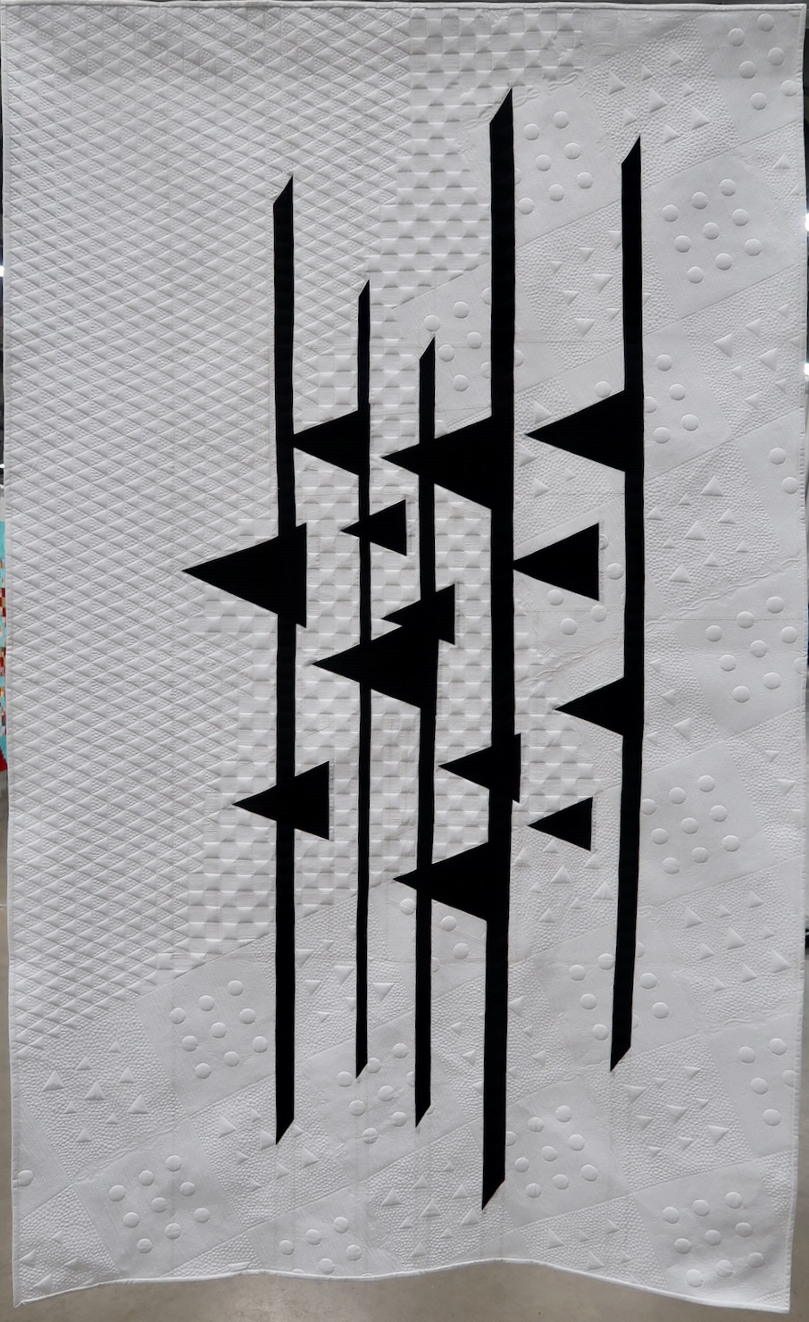 "Deportation" by Jackie Benedetti, quilted by Rachael Dorr